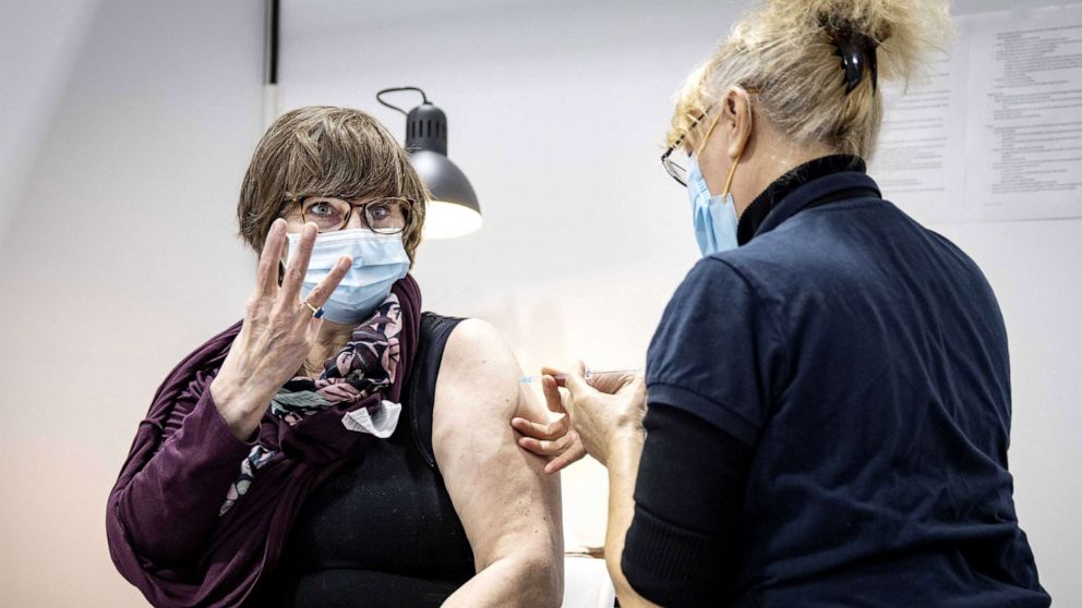 PHOTO: A health employee injects a booster shot in the XL vaccination location of the Public Health Service GGD in the Jaarbeurs exhibition and convention centre in Utrecht, the Netherlands, Nov. 19, 2021. 