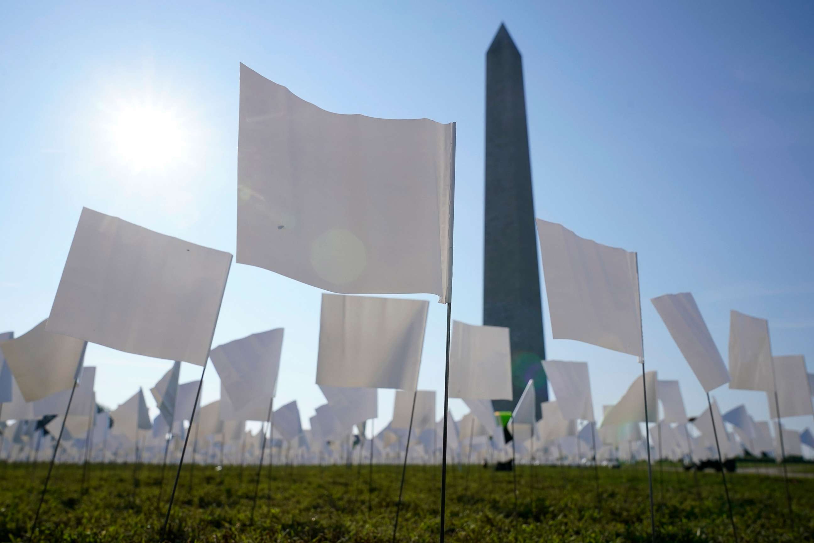 PHOTO: White flags stand near the Washington Monument on the National Mall in Washington, D.C., Sept. 15, 2021.