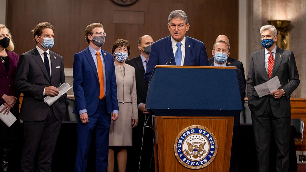 PHOTO: Sen. Joe Manchin (D-WV) speaks alongside a bipartisan group of Democrat and Republican members of Congress as they announce a proposal for a Covid-19 relief bill on Capitol Hill, Dec. 1, 2020.