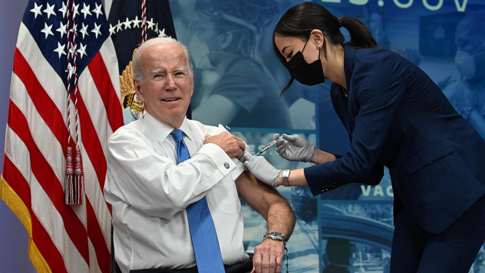 PHOTO: President Joe Biden receives the latest Covid-19 booster shot in the South Court Auditorium of the Eisenhower Executive Office Building, next to the White House, in Washington, Oct. 25, 2022. 