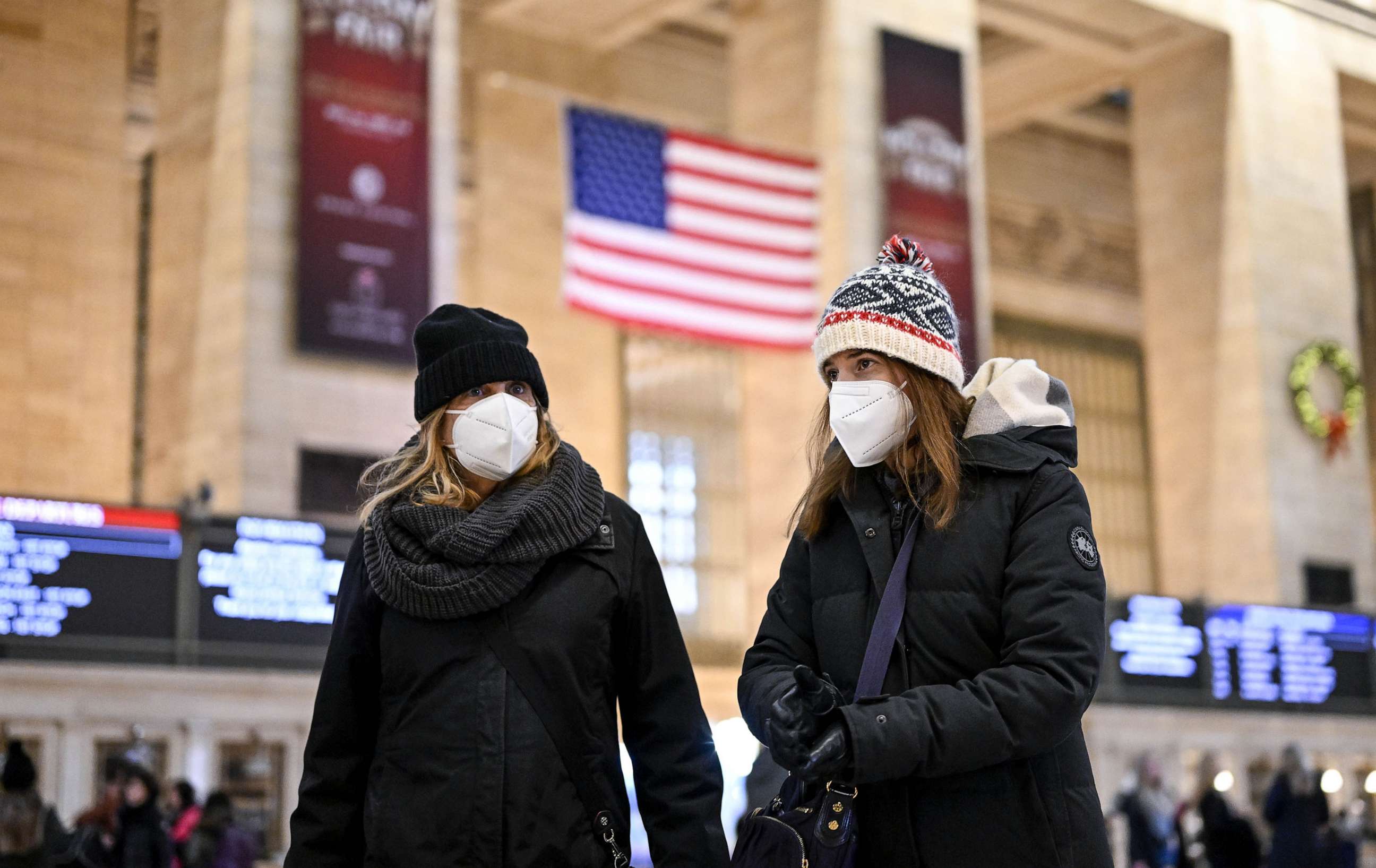 PHOTO: People wear mask after New York City's health officials have issued an advisory, strongly urging New Yorkers to use masks as COVID-19, flu, and RSV cases rise, on Dec. 12, 2022, in New York.