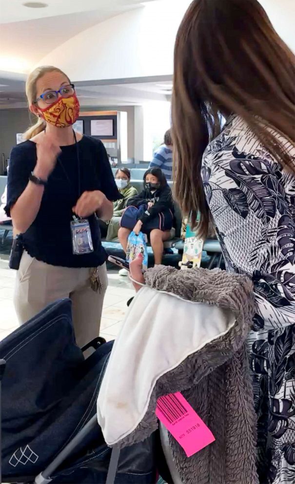 PHOTO: Chaya Bruck confronts a gate agent in Orlando, Fla after her six children were kicked off of an Orlando JetBlue Airways flight in August because her 2-year-old daughter refused to wear a mask.