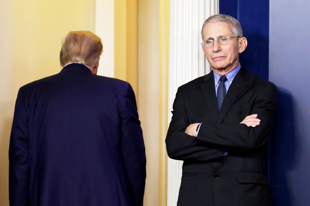 PHOTO: Anthony Fauci, director of the National Institute of Allergy and Infectious Diseases, right, stands as President Donald Trump exits during a Coronavirus Task Force news conference at the White House in Washington, March, 26, 2020.