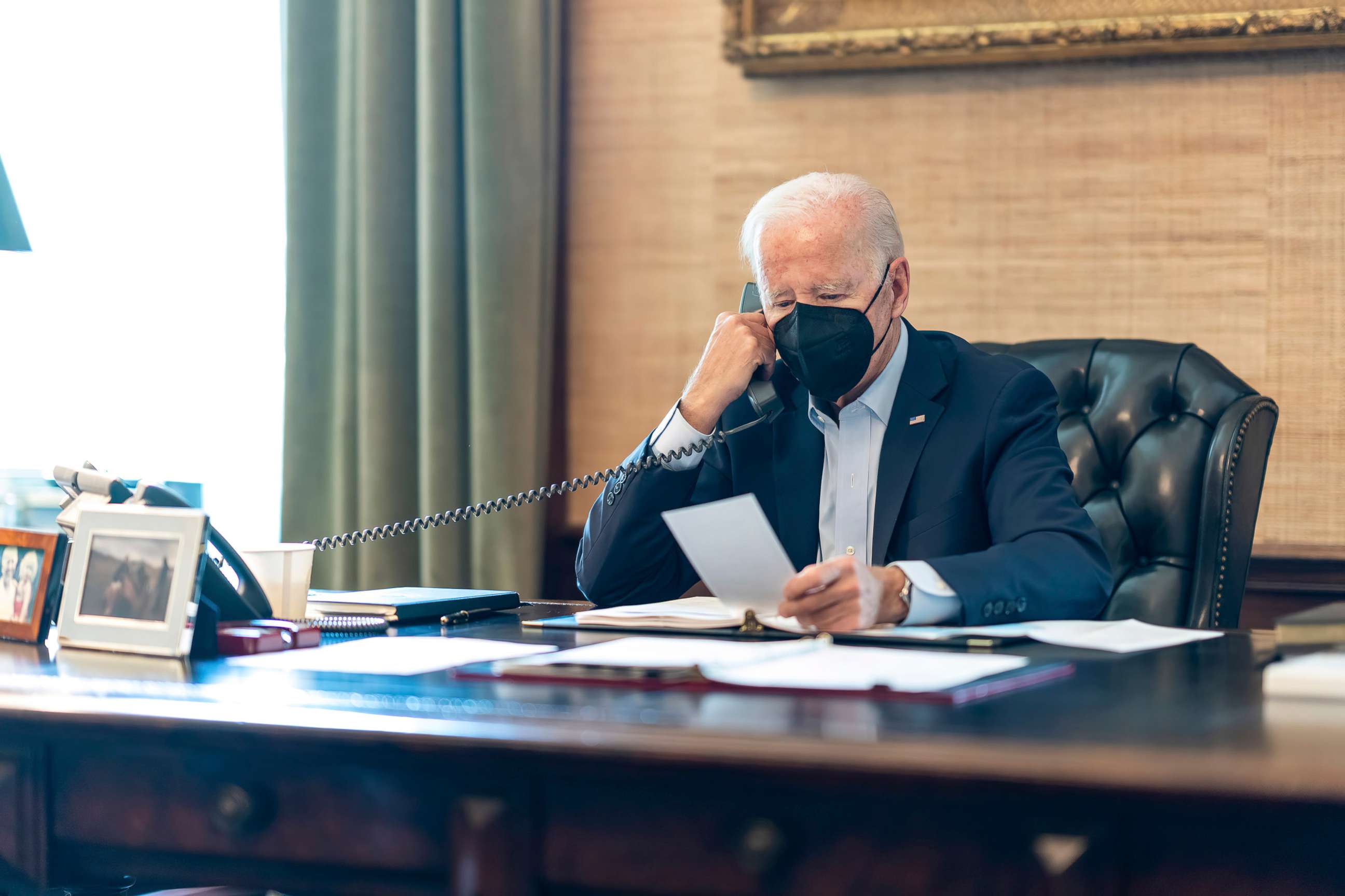 PHOTO: President Joe Biden talks on the phone with his national security team from the Treaty Room in the residence of the White House in Washington, Friday, July 22, 2022. 