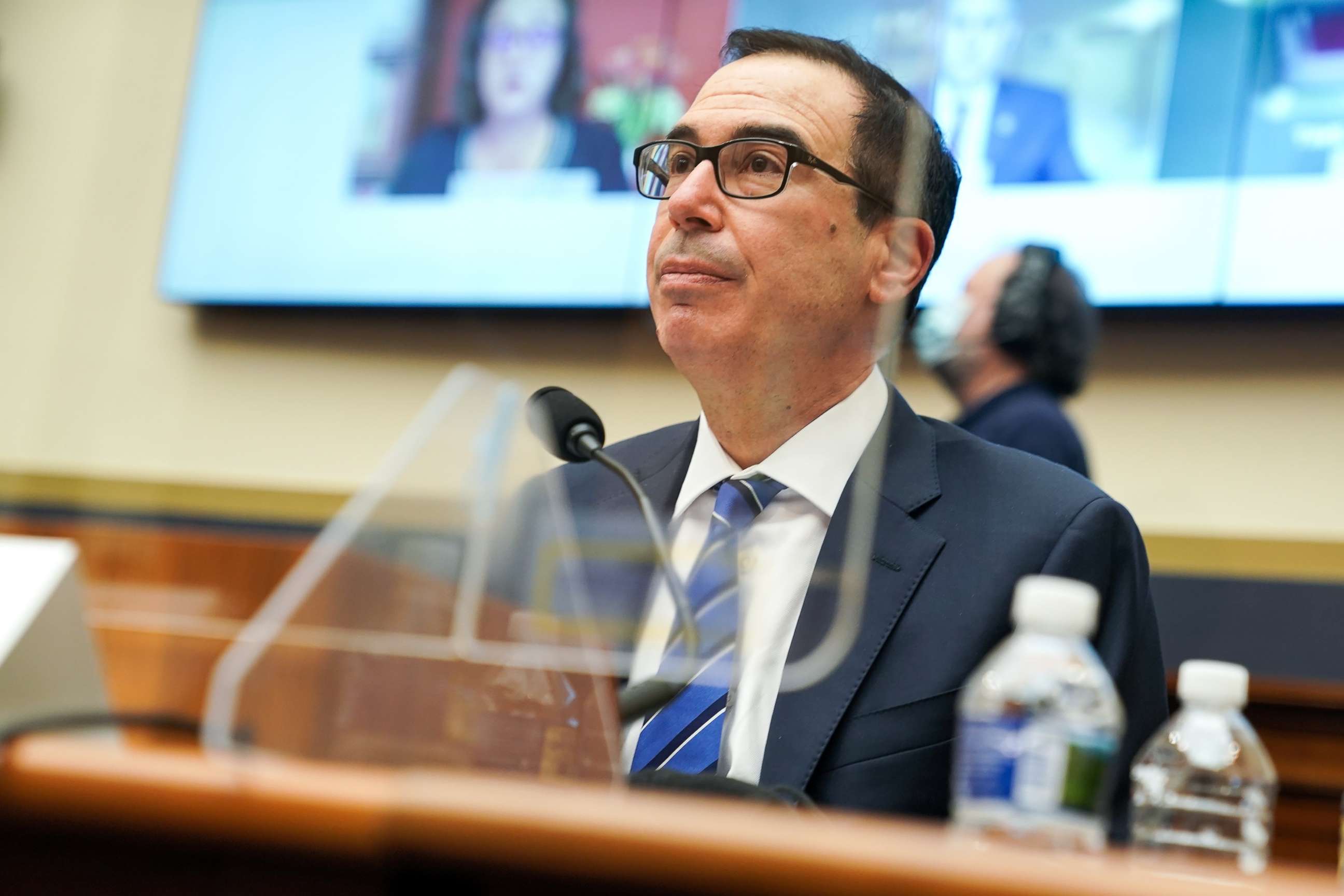 PHOTO: Treasury Secretary Steven Mnuchin listens to a question during a House Financial Services Committee oversight hearing to discuss the Treasury Department's and Federal Reserve's response to the coronavirus pandemic on Dec. 02, 2020 in Washington.