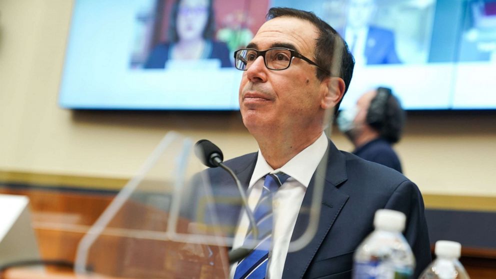 PHOTO: Treasury Secretary Steven Mnuchin listens to a question during a House Financial Services Committee oversight hearing to discuss the Treasury Department's and Federal Reserve's response to the coronavirus pandemic on Dec. 02, 2020 in Washington.