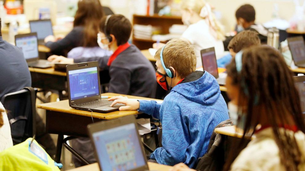 PHOTO: Students start their work for the day at Freedom Preparatory Academy in Provo, Utah, Feb. 10, 2021.