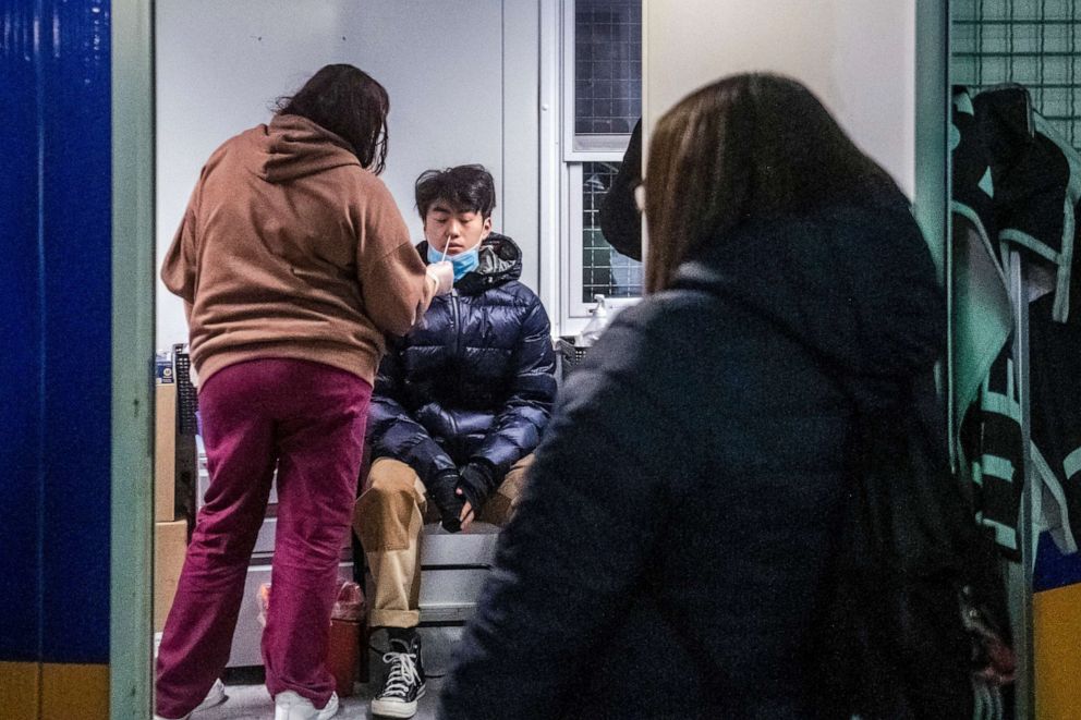 PHOTO: A man swabbed during a COVID-19 test on the Lower East Side of Manhattan, Dec. 21, 2021, in New York.