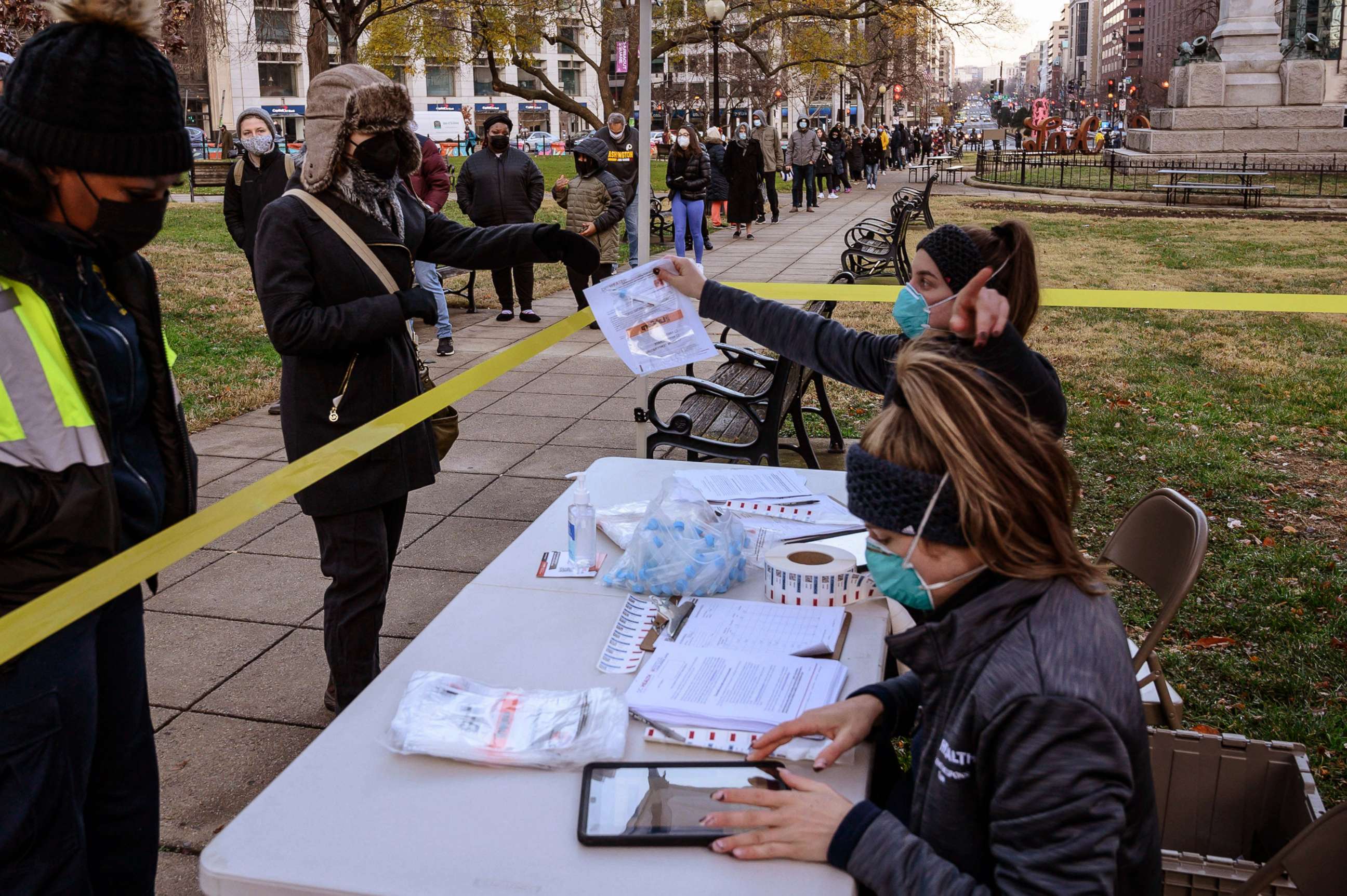 PHOTO: People queue up at a COVID-19 testing site in Washington D.C., Dec. 22, 2021.