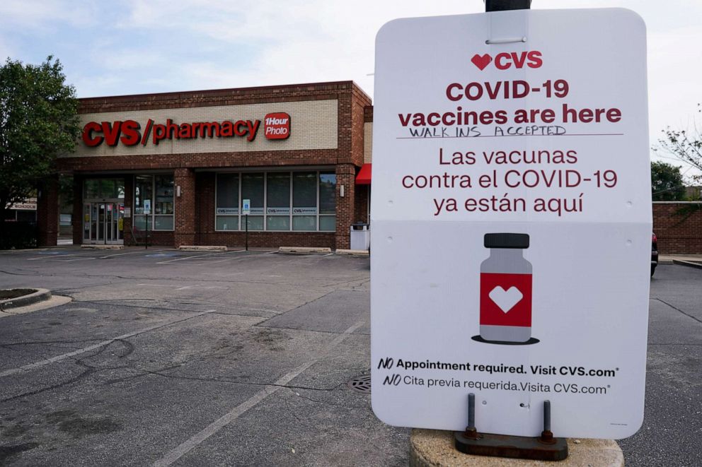 PHOTO: An information sign regarding COVID-19 vaccines is seen outside of a CVS store in Chicago, Ill., Aug. 13, 2021.