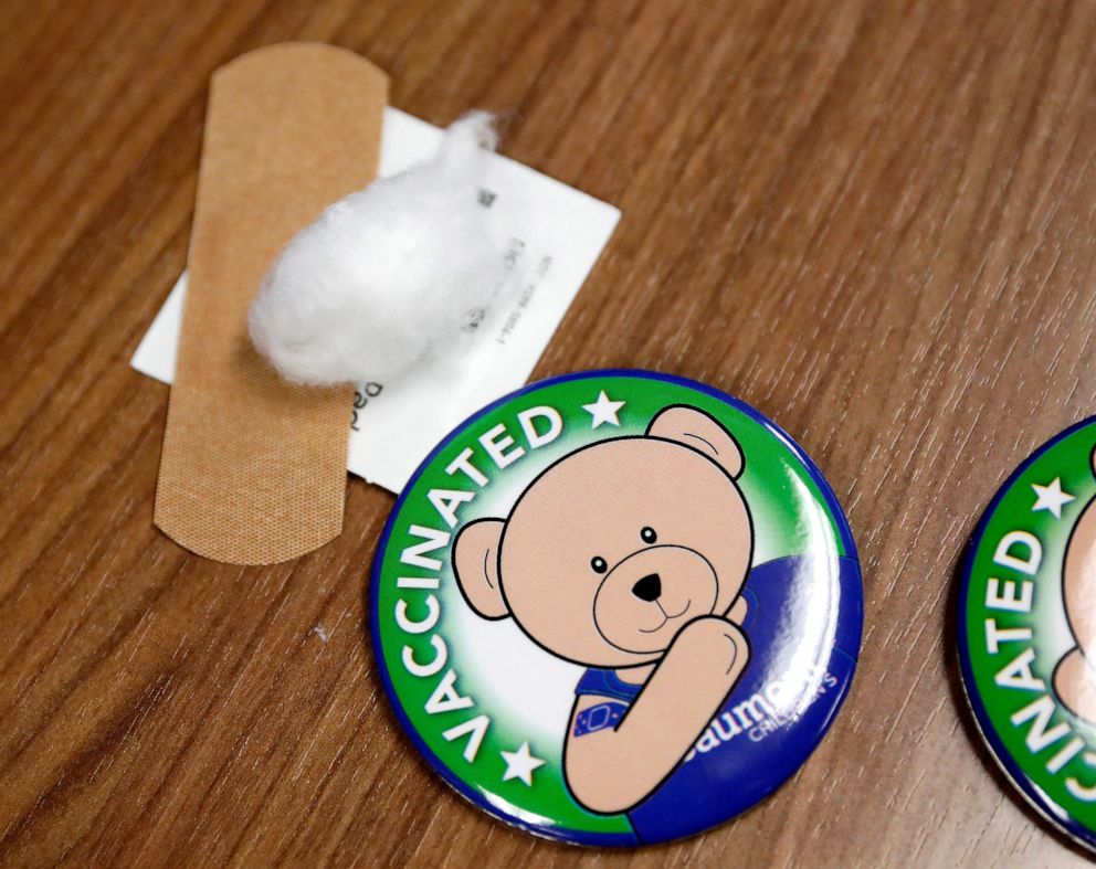 PHOTO: Pins that will be given to children after receiving their Pfizer Covid-19 vaccine are seen at Beaumont Health offices in Southfield, Mich., Nov. 5, 2021. To date, children younger than 5 are not eligible to receive the Pfizer Covid-19 vaccine.  
