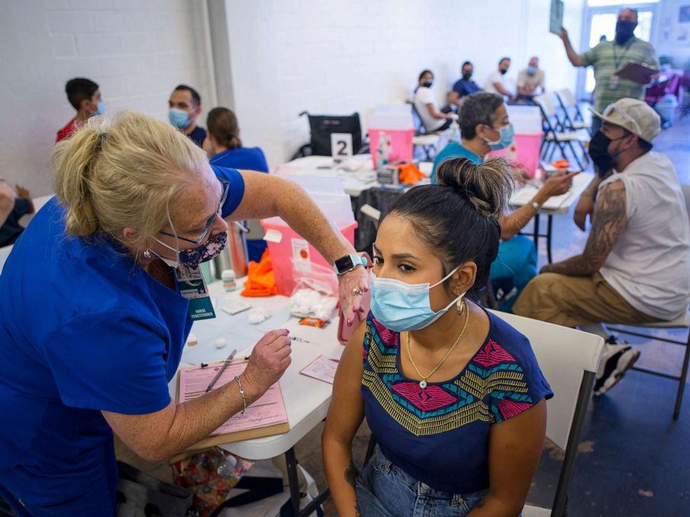 PHOTO: Raquel Gonzales, 27, receives a coronavirus vaccine during a free vaccination clinic in San Antonio, Texas, Sept. 11, 2021.