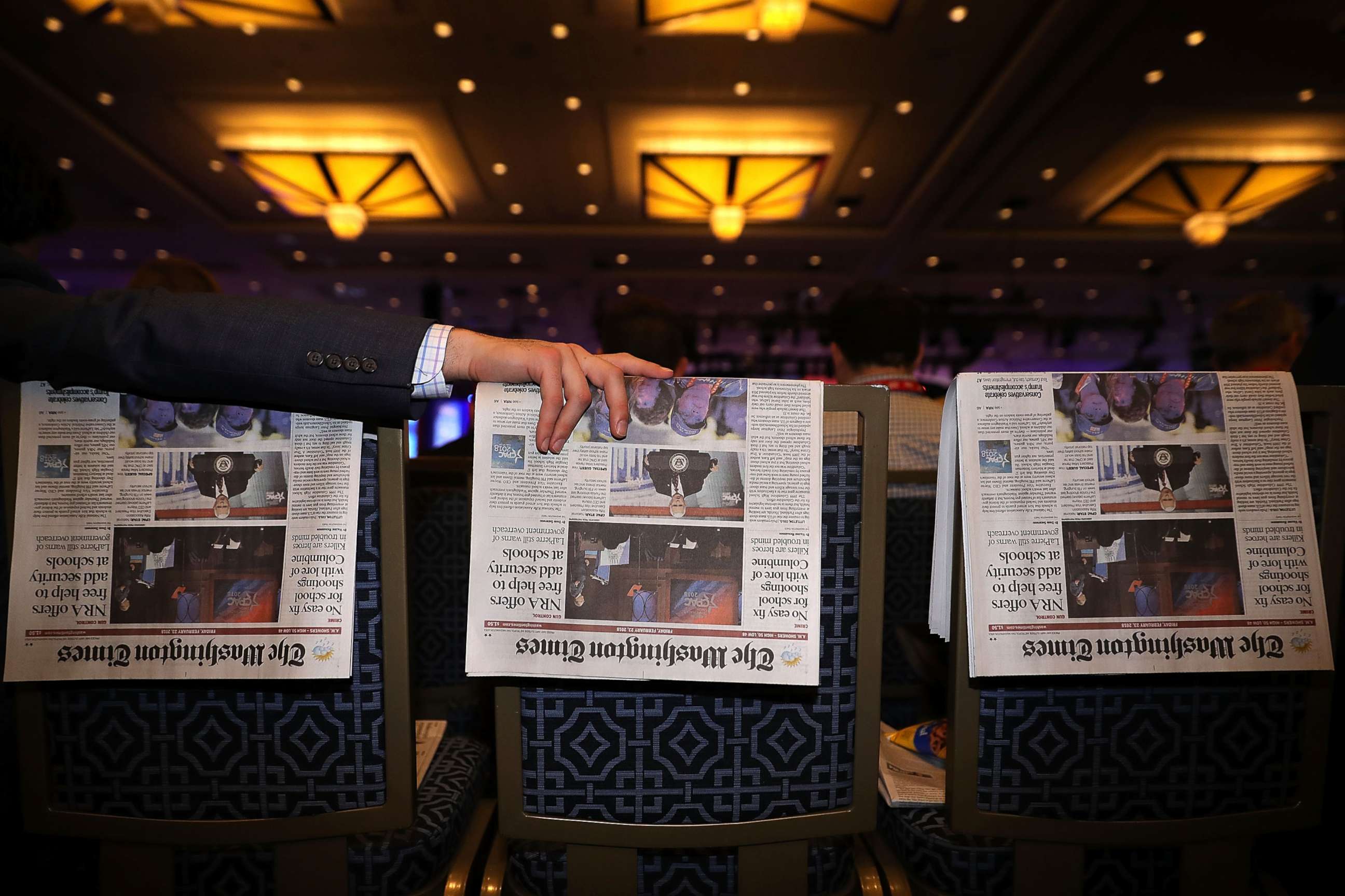 PHOTO: Newspapers are used as place-holders for people arriving early at the Conservative Political Action Conference at the Gaylord National Resort and Convention Center Feb. 23, 2018 in National Harbor, Md.