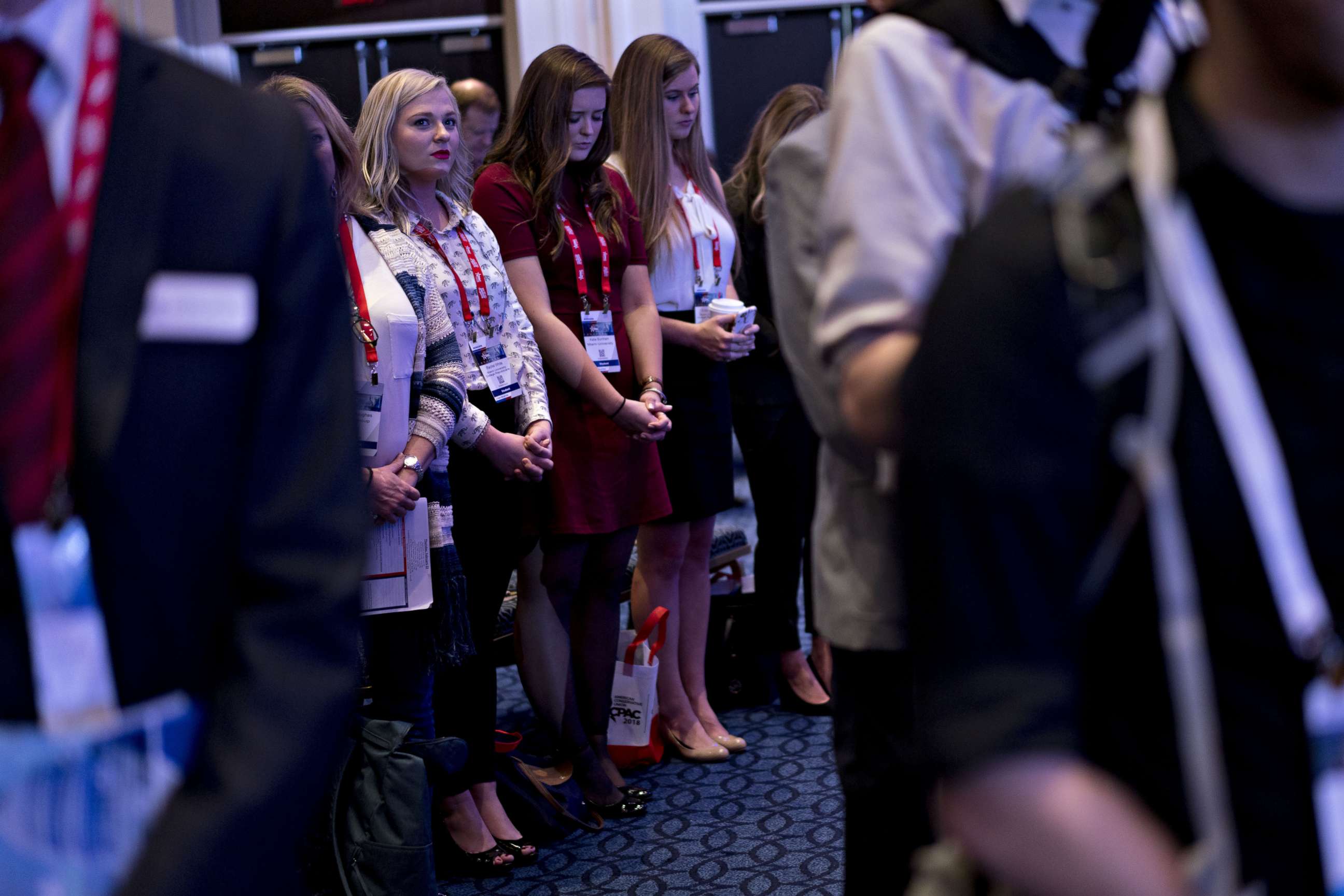 PHOTO: Attendees listen to a prayer at the Conservative Political Action Conference  in National Harbor, Md., Feb. 22, 2018