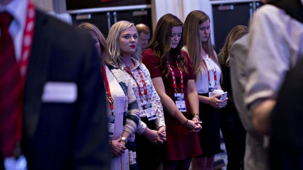 PHOTO: Attendees listen to a prayer at the Conservative Political Action Conference  in National Harbor, Md., Feb. 22, 2018