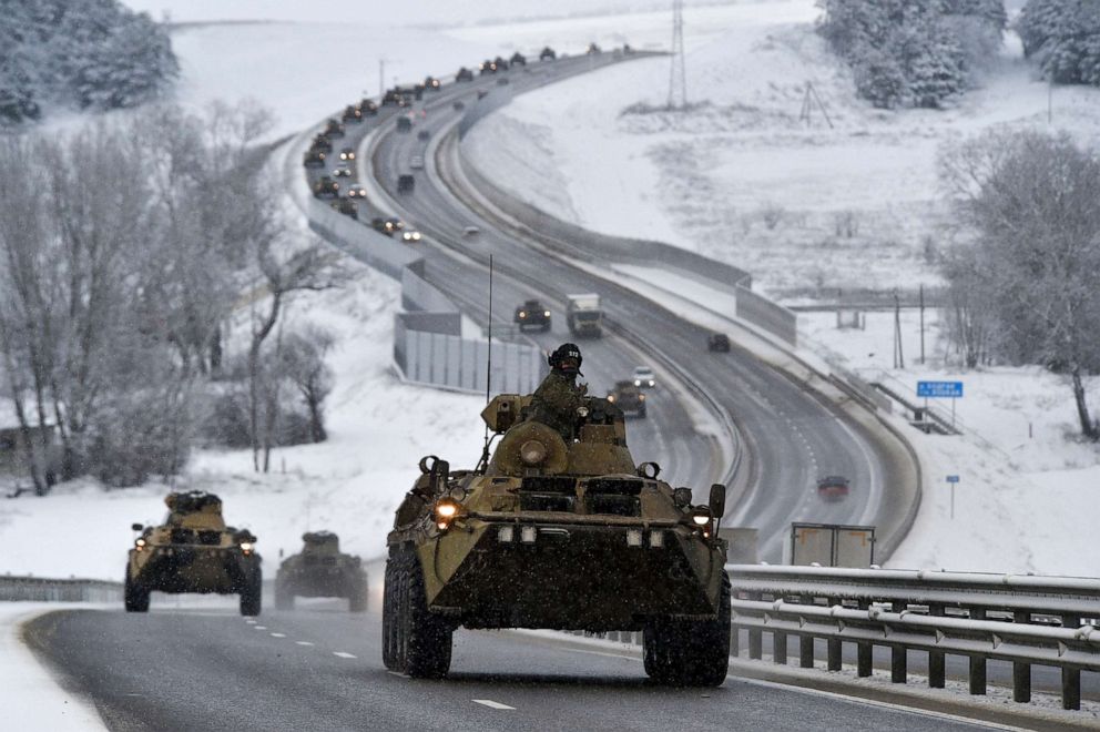 PHOTO: A convoy of Russian armored vehicles moves along a highway in Crimea, Jan. 18, 2022. 