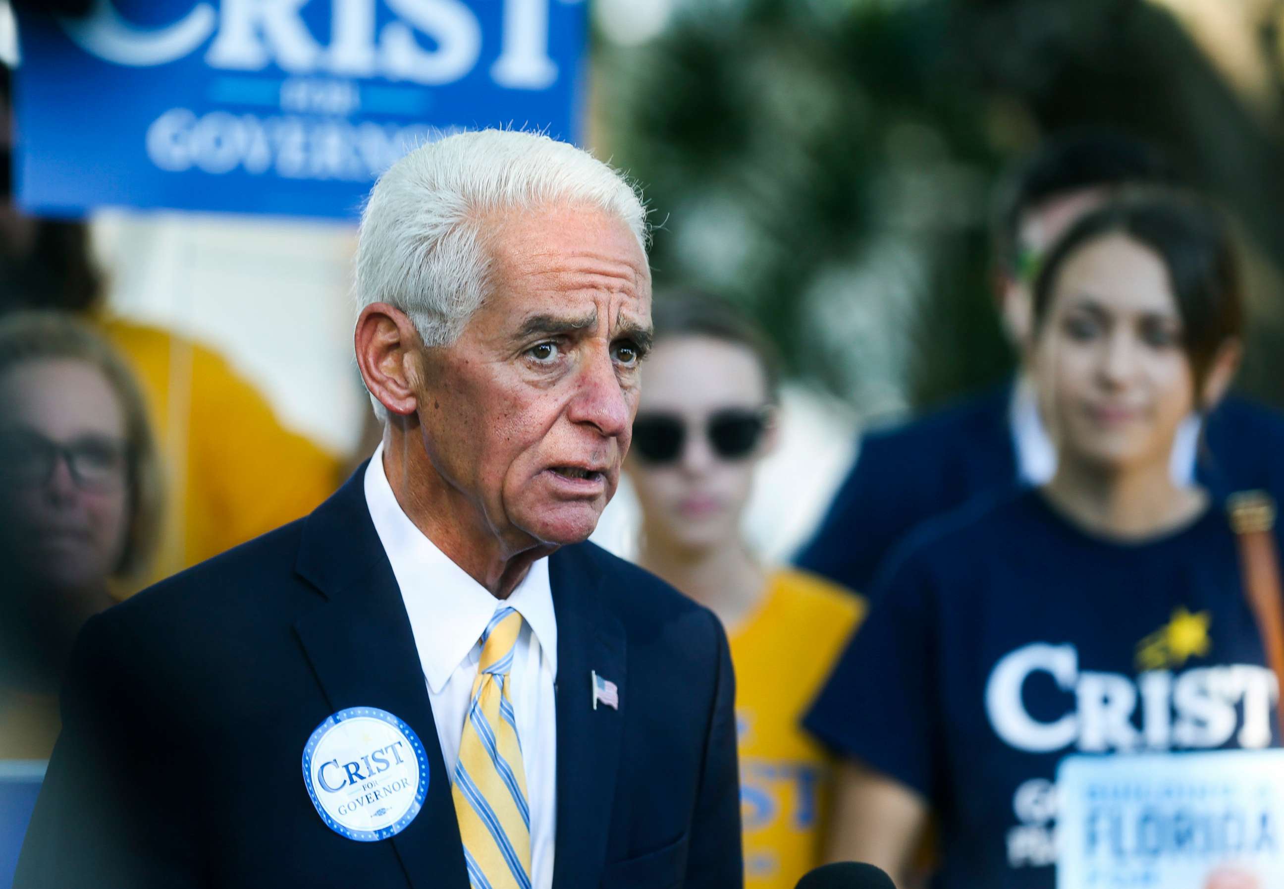PHOTO: Rep. Charlie Crist addresses supporters and members of the media as he arrives to vote in person on Election Day at Gathering Church, Aug. 23, 2022, in St. Petersburg, Fla.