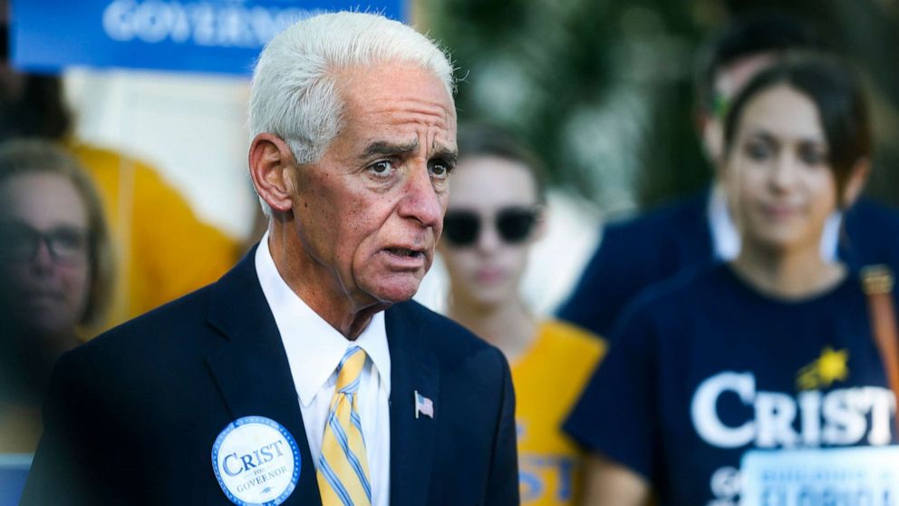 PHOTO: Rep. Charlie Crist addresses supporters and members of the media as he arrives to vote in person on Election Day at Gathering Church, Aug. 23, 2022, in St. Petersburg, Fla.