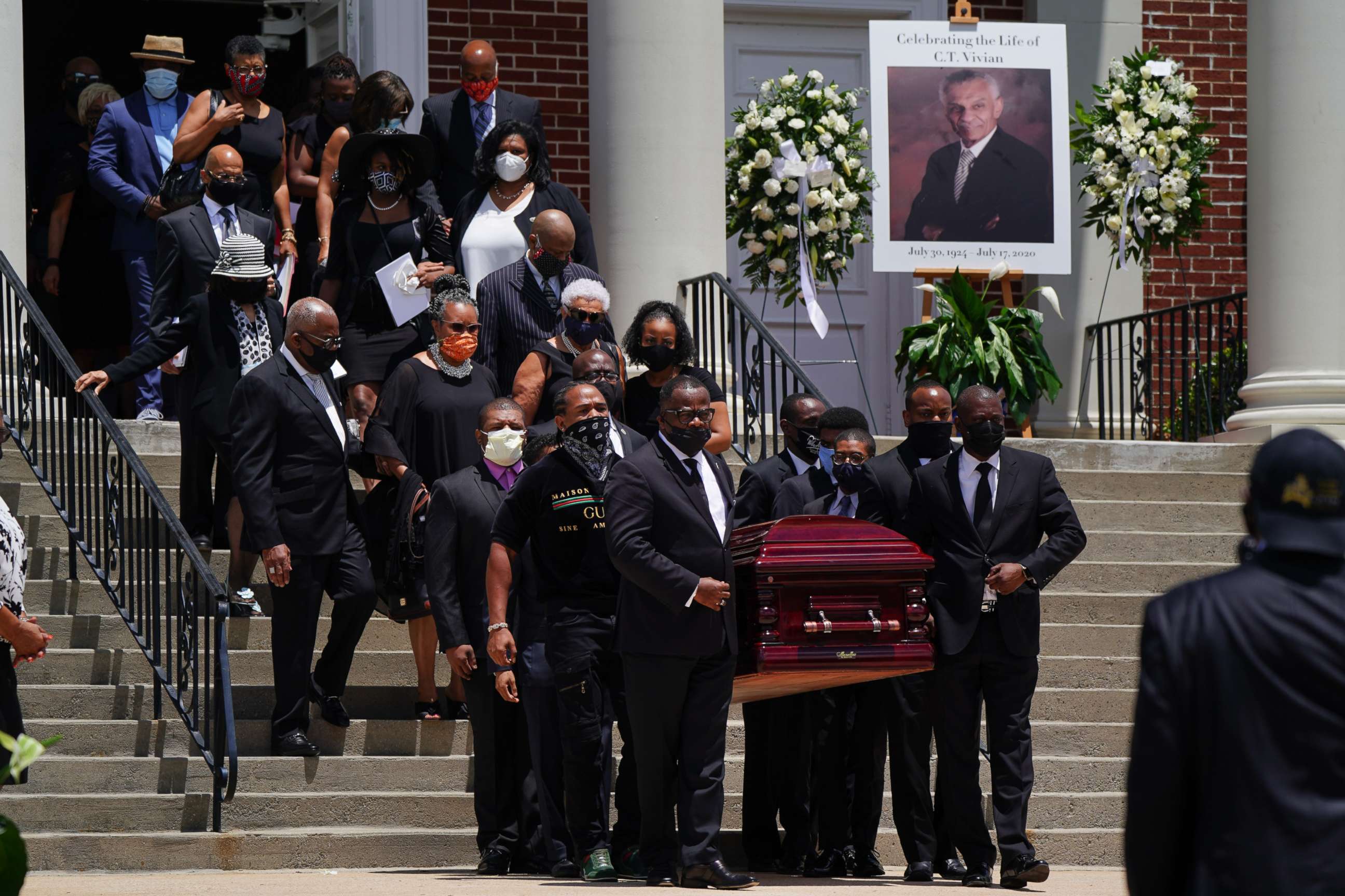PHOTO: The casket holding the body of civil rights icon C.T. Vivian is carried out of Providence Missionary Baptist Church following his funeral service on July 23, 2020 in Atlanta, Georgia.