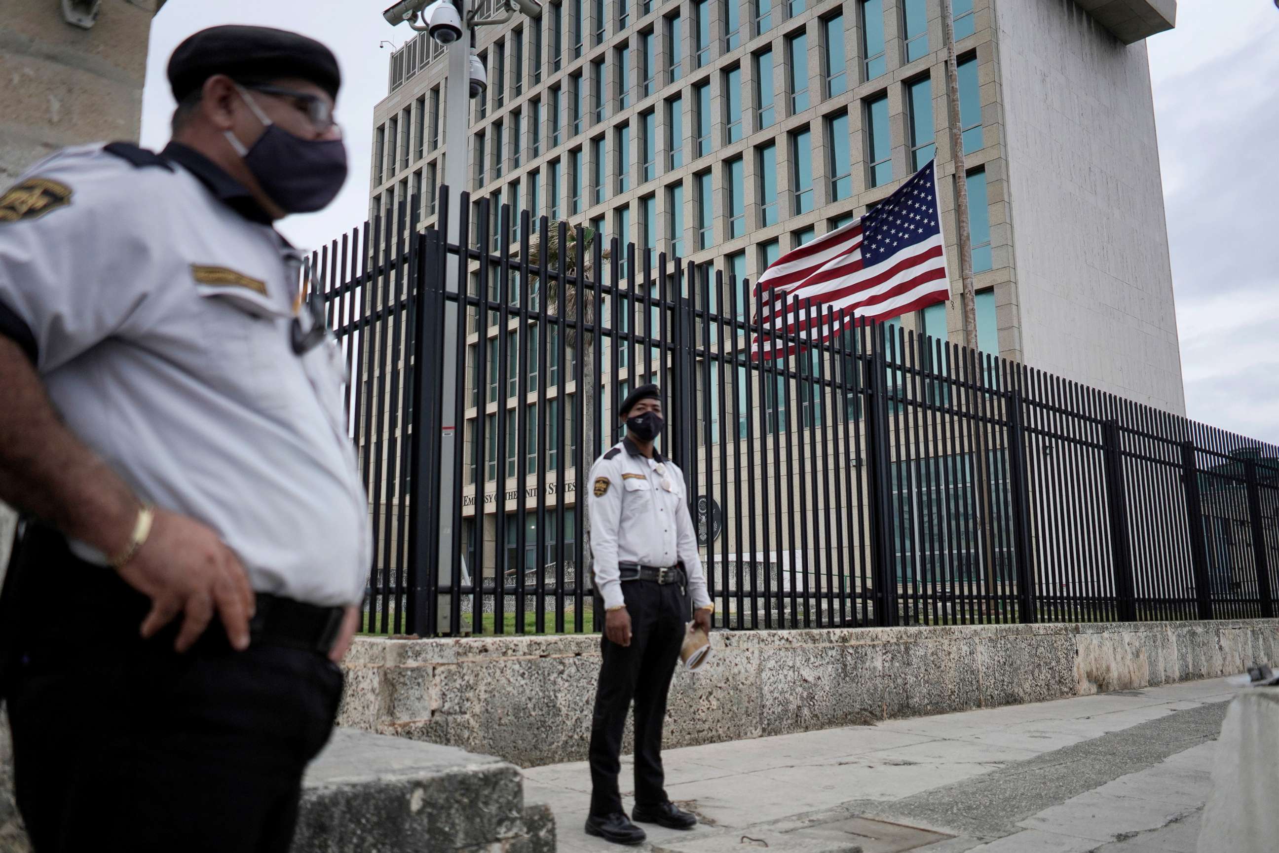 PHOTO: The U.S. flag flies next to security guarding the U.S. embassy in Havana, Jan. 12, 2021. 