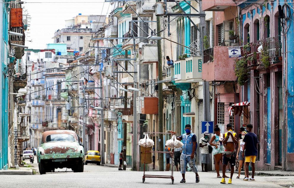 PHOTO: People gather on a street amid the ongoing coronavirus COVID-19 pandemic in Havana, Cuba, June 18, 2020. 