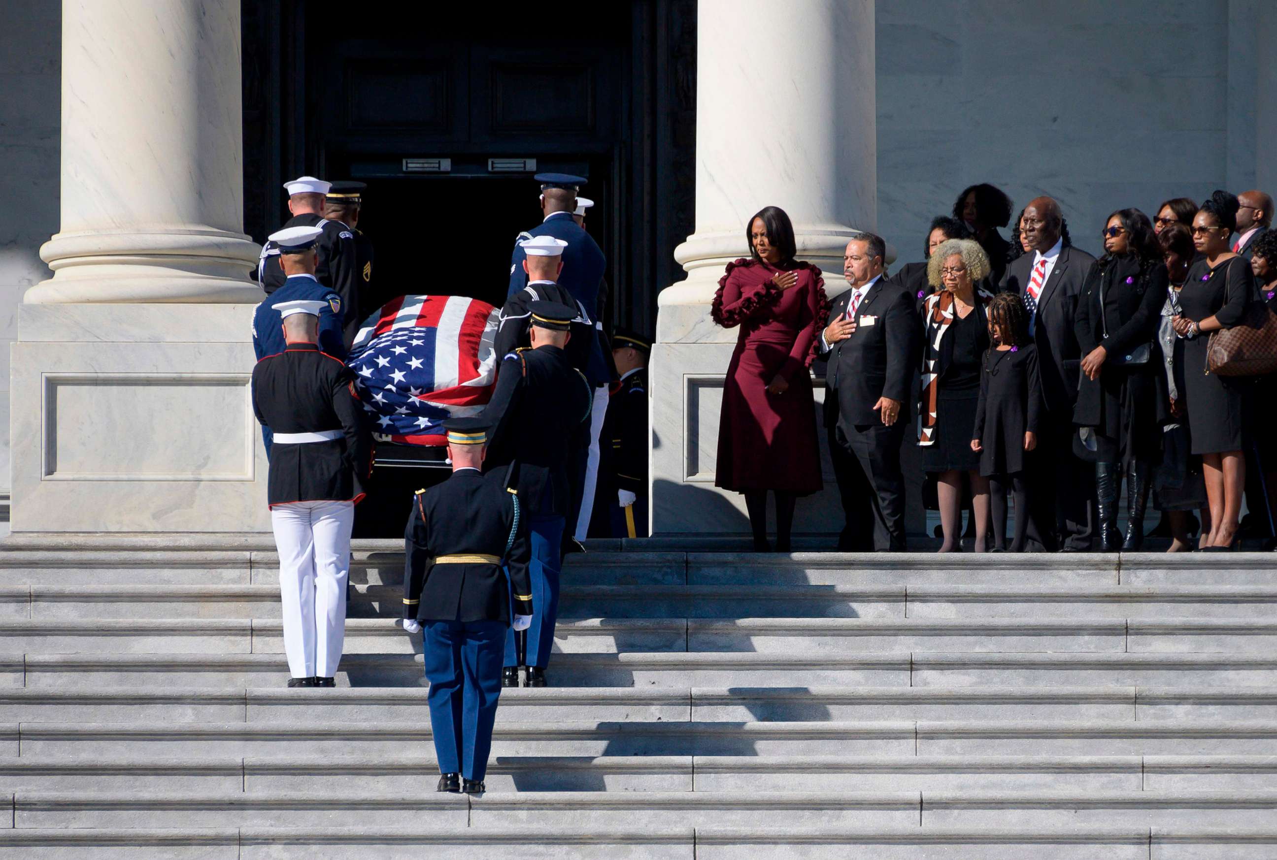 PHOTO: Maya Rockeymoore Cummings, center, watches with family and friends as the casket of Rep. Elijah Cummings arrives at the U.S. Capitol to lie in state on Oct. 24, 2019, in Washington D.C.