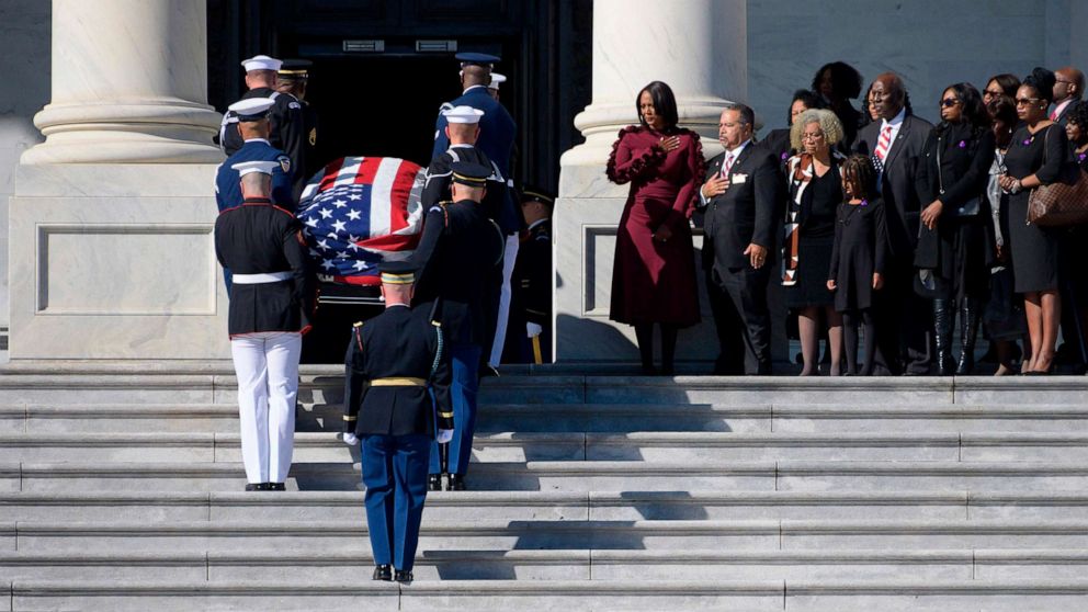 PHOTO: Maya Rockeymoore Cummings, center, watches with family and friends as the casket of Rep. Elijah Cummings arrives at the U.S. Capitol to lie in state on Oct. 24, 2019, in Washington D.C.