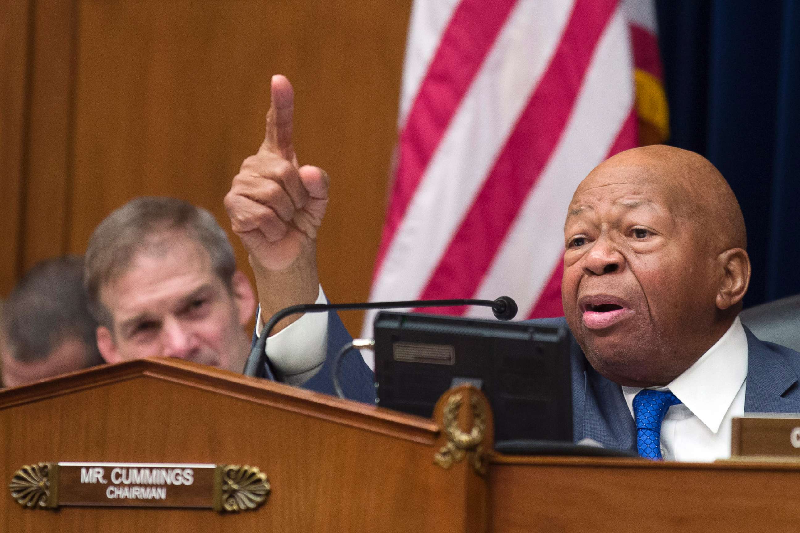 PHOTO: House Oversight and Reform Committee Chair Elijah Cummings gives closing remarks as Rep. Jim Jordan, left, listens, following the testimony of Michael Cohen, at the House Oversight and Reform Committee on Capitol Hill, Feb. 27, 2019.