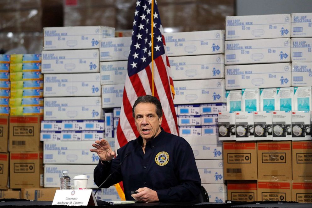 PHOTO: New York Governor Andrew Cuomo speaks in front of stacks of medical protective supplies during a news conference at the Jacob K. Javits Convention Center, in New York.