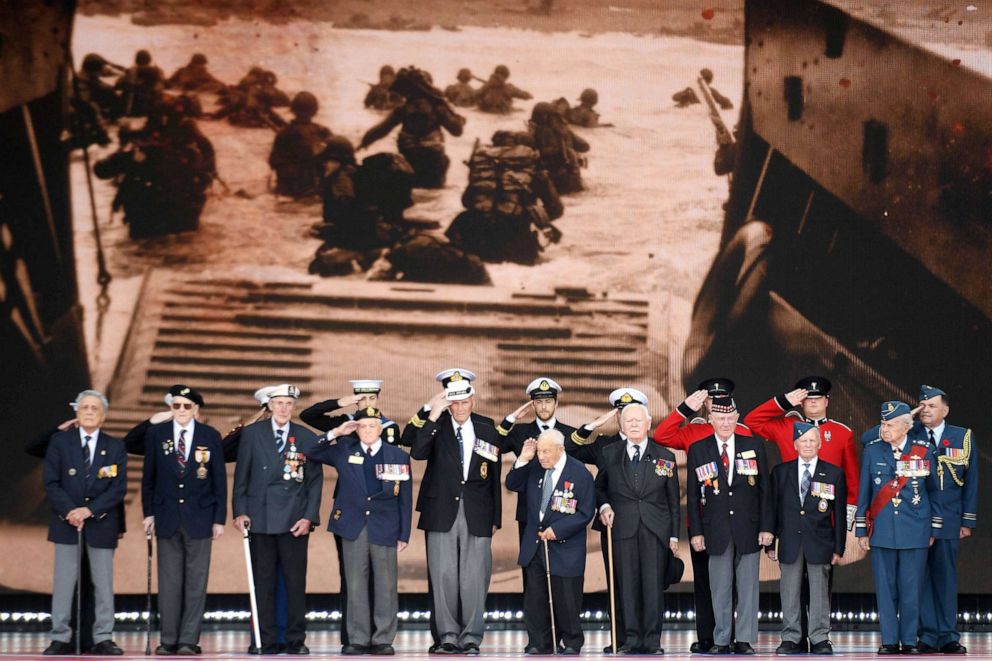 PHOTO: D-Day veterans are presented on stage during an event to commemorate the 75th anniversary of the D-Day landings, in Portsmouth, southern England, June 5, 2019.