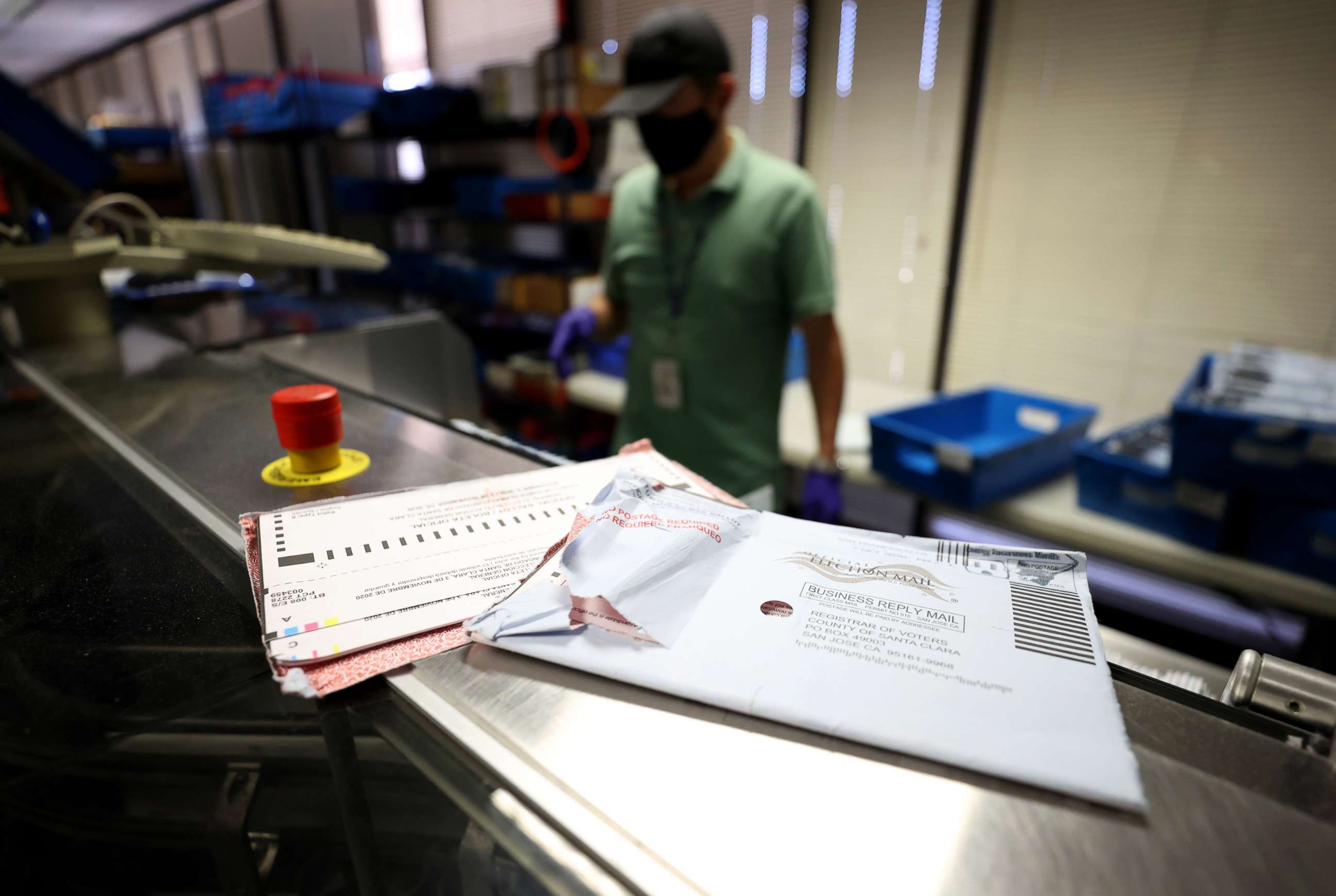PHOTO: Damaged mail-in ballots sit on a sorting machine at the Santa Clara County registrar of voters office on October 13, 2020 in San Jose, Calif.