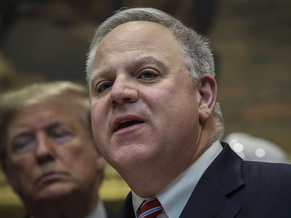 PHOTO: President Donald Trump looks on as Secretary of the Interior David Bernhardt speaks during an event to unveil significant changes to the National Environmental Policy Act in the Roosevelt Room of the White House on Jan. 9, 2020 in Washington, D.C. 