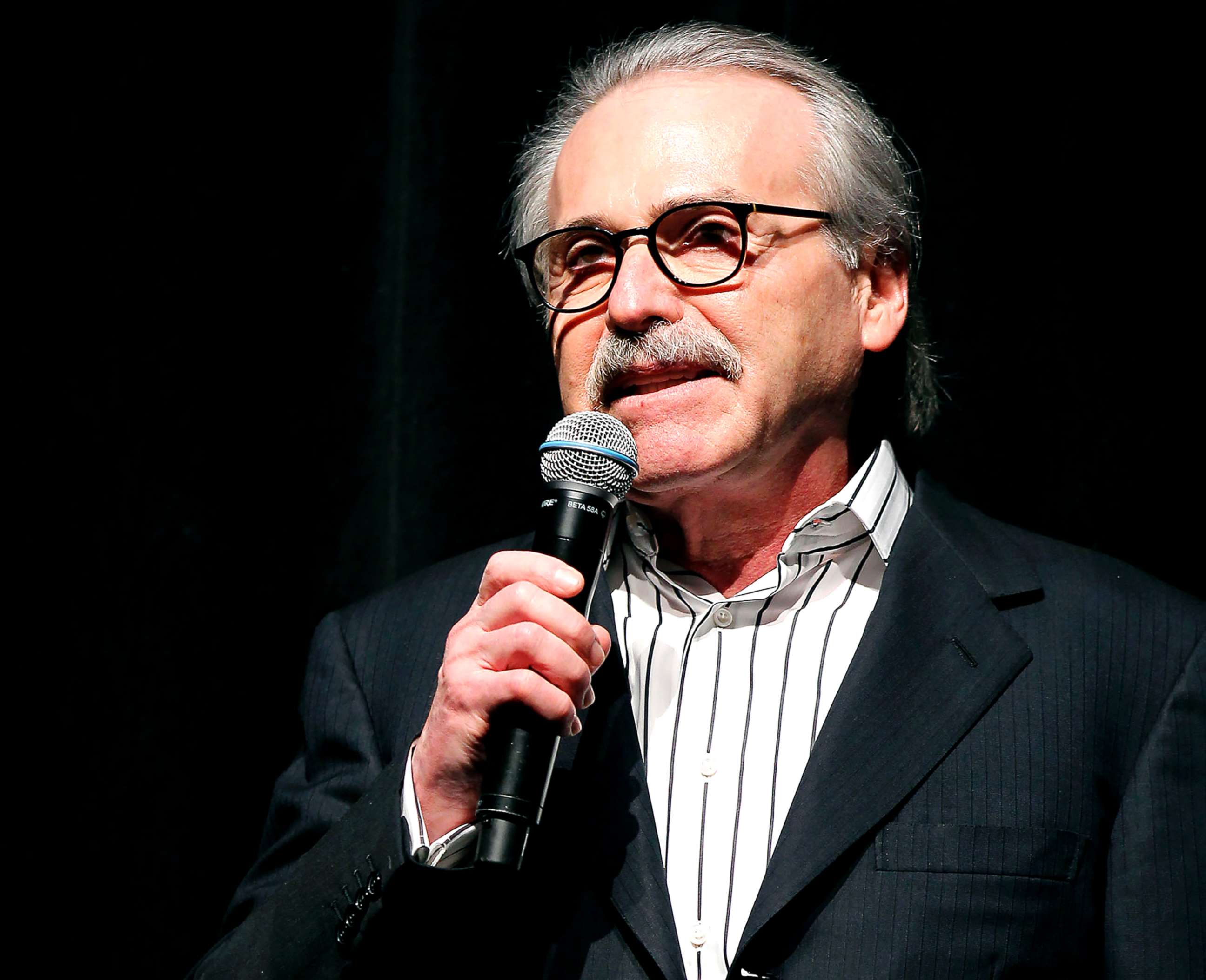PHOTO: In this file photo dated Jan. 31, 2014, David Pecker, Chairman and CEO of American Media, which publishes the National Enquirer, addresses those attending the Shape & Men's Fitness Super Bowl Party in New York.