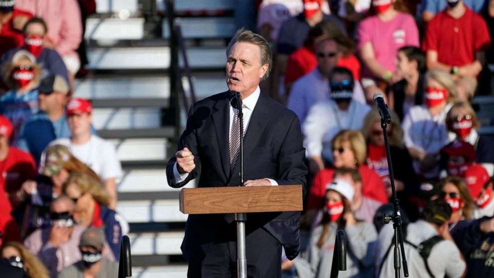 PHOTO: Sen. David Perdue, R-Ga., speaks during a campaign rally for President Donald Trump at Middle Georgia Regional Airport, Friday, Oct. 16, 2020, in Macon, Ga. 