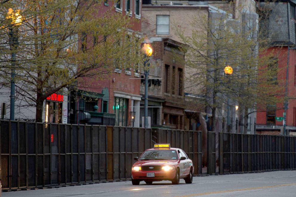 PHOTO: A taxi drives past fences setup ahead of the nuclear security summit, March 30, 2016, in Washington, DC.