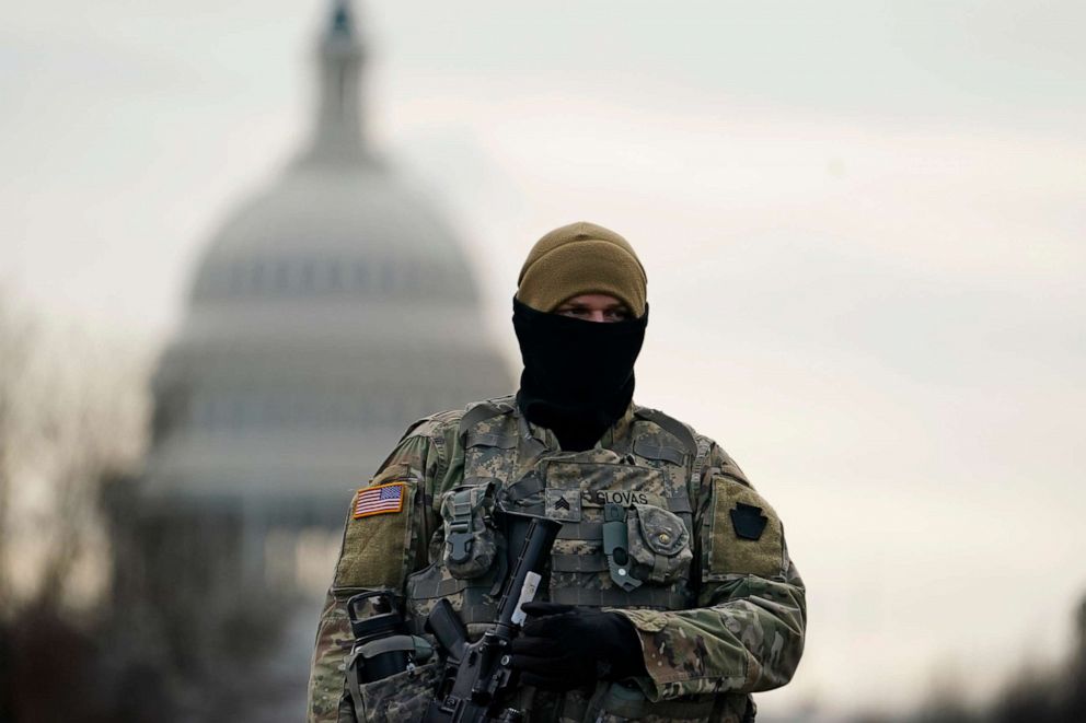 PHOTO: A National Guards stands at a road block outside the Capitol as security is ramped ahead of President-elect Joe Biden's inauguration ceremony, Jan. 18, 2021, in Washington.