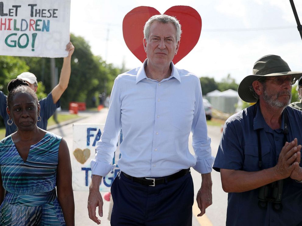PHOTO: New York City Mayor Bill De Blasio and his wife, Chirlane McCray, visit the outside of a detention center for migrant children, June 27, 2019, in Homestead, Florida.
