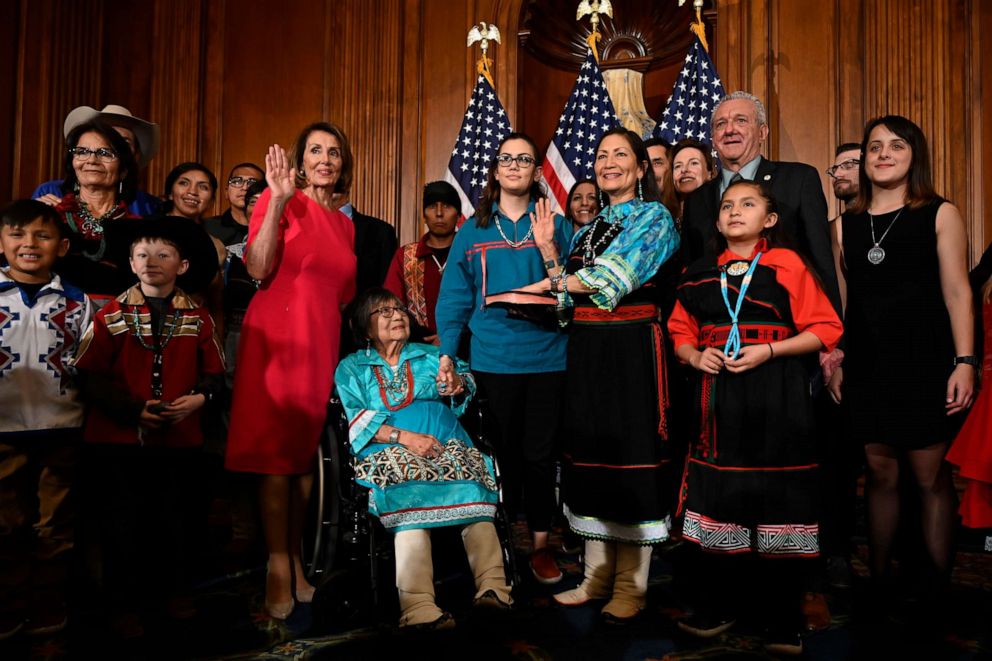 PHOTO: House Speaker Nancy Pelosi poses during a ceremonial swearing-in with Rep. Deb Haaland, on Capitol Hill, Jan. 3, 2019.