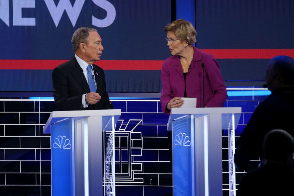 PHOTO: Democratic presidential candidates former New York City Mayor Mike Bloomberg, left, and Sen. Elizabeth Warren speak during the Democratic presidential primary debate at Paris Las Vegas, Feb. 19, 2020, in Las Vegas. Feb. 19, 2020, in Las Vegas.