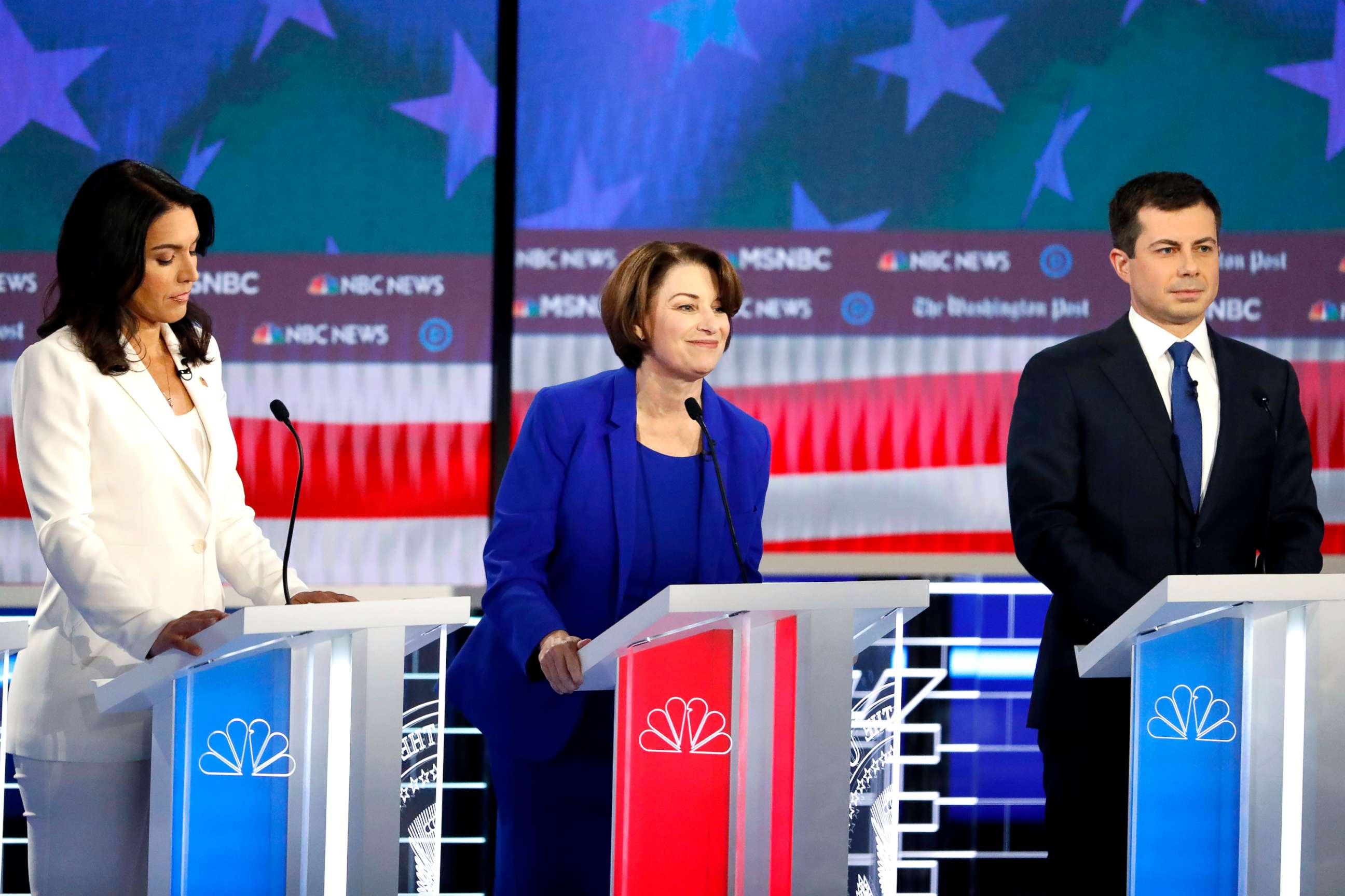 PHOTO: Democratic presidential candidates Rep. Tulsi Gabbard, D-Hawaii, Sen. Amy Klobuchar, D-Minn., and South Bend, Ind., Mayor Pete Buttigieg, participate in a Democratic presidential primary debate, Nov. 20, 2019, in Atlanta. 