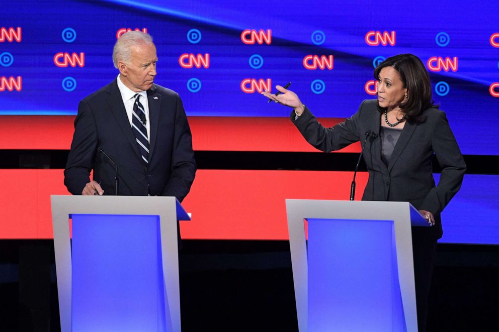 PHOTO: Democratic presidential hopeful former Vice President Joe Biden listens as U.S. Senator Kamala Harris speaks during the second Democratic primary debate of the 2020 presidential campaign season at the Fox Theatre in Detroit on July 31, 2019.