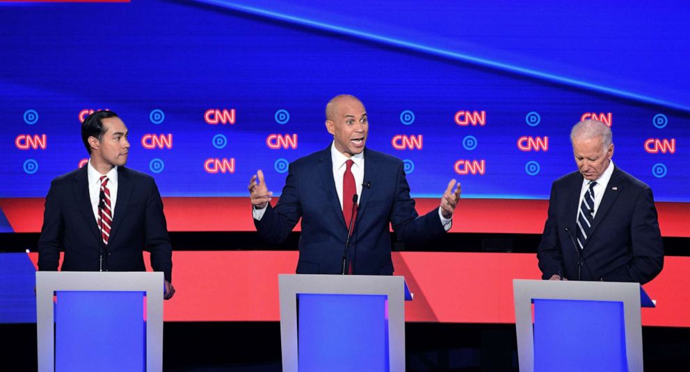 PHOTO: Democratic presidential hopefuls former Secretary of Housing and Urban Development Julian Castro, Sen. Cory Booker and former Vice President Joe Biden speak during the second round of the second Democratic primary debate in Detroit, July 31, 2019.