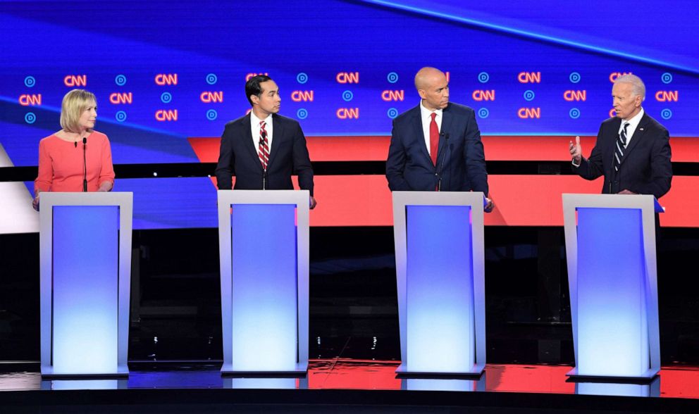 PHOTO: Democratic presidential hopefuls Sen. Kirsten Gillibrand,Julian Castro, Sen. Cory Booker and former Vice President Joe Biden speak during the second round of the second Democratic primary debate in Detroit, July 31, 2019.