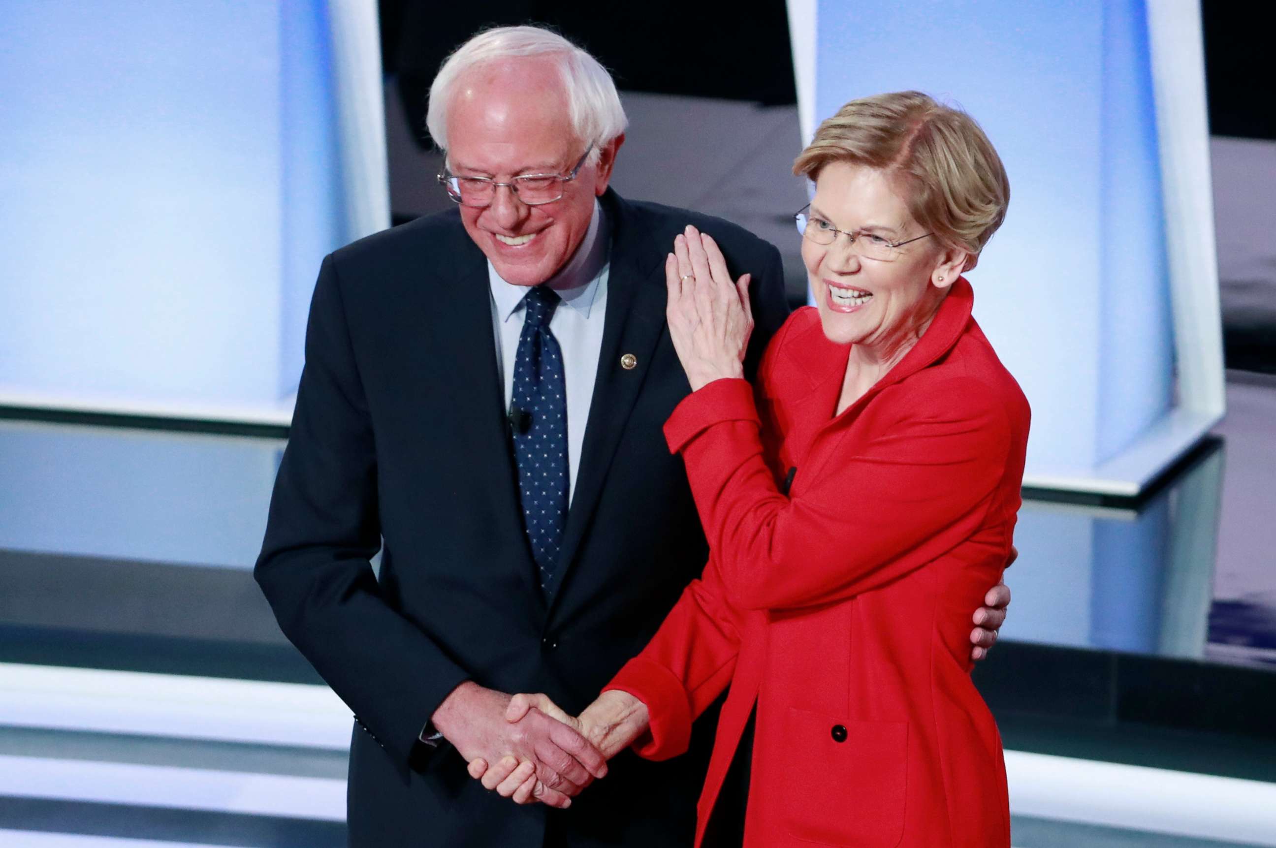 PHOTO: Senator Bernie Sanders and Senator Elizabeth Warren shake hands before the start of the first night of the second 2020 Democratic presidential debate in Detroit, July 30, 2019. 