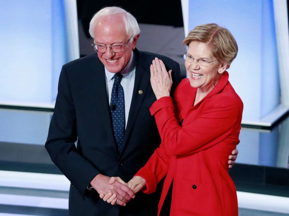 PHOTO: Senator Bernie Sanders and Senator Elizabeth Warren shake hands before the start of the first night of the second 2020 Democratic presidential debate in Detroit, July 30, 2019.