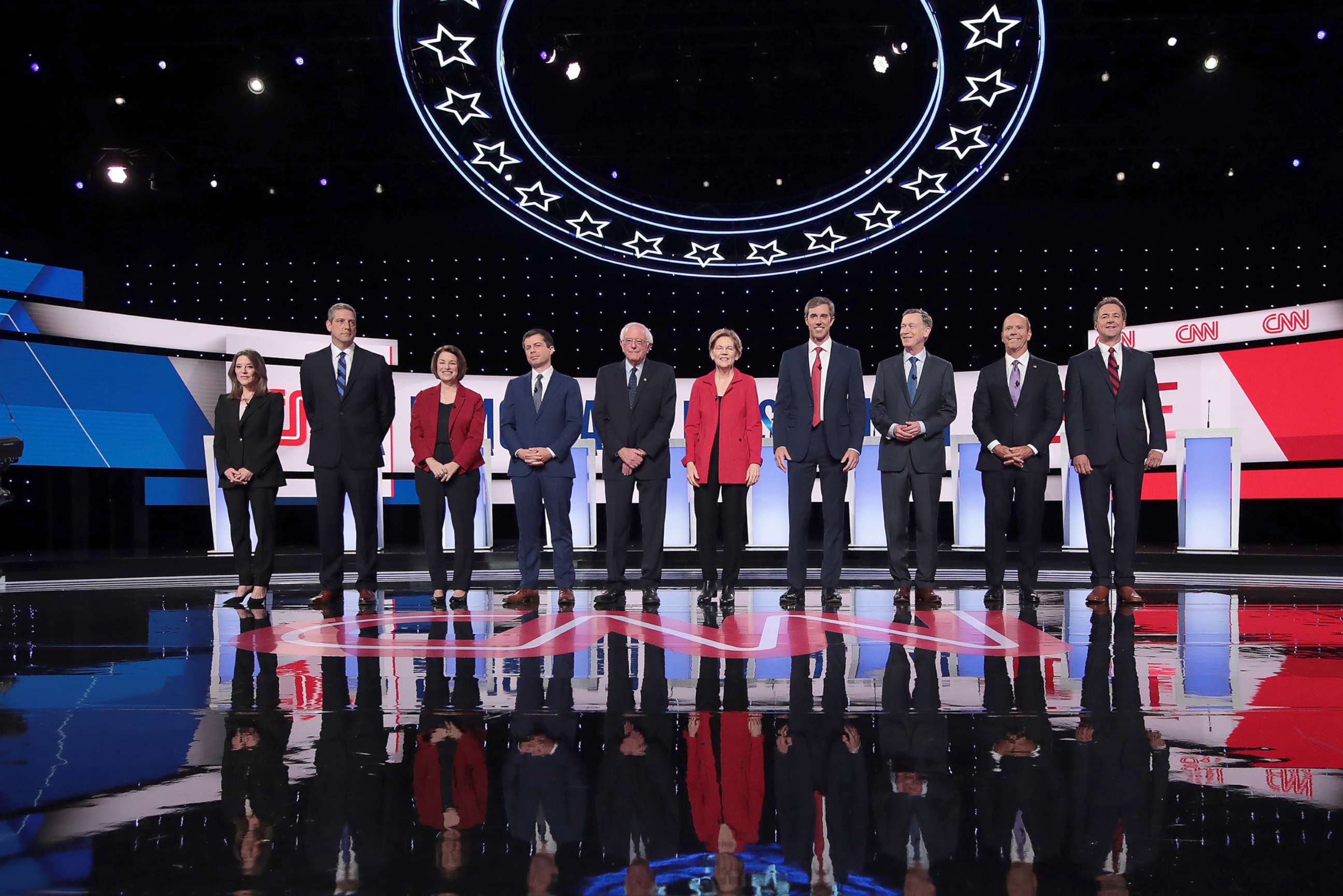 PHOTO: Democratic presidential candidates take the stage at the beginning of the Democratic Presidential Debate at the Fox Theatre, July 30, 2019, in Detroit.