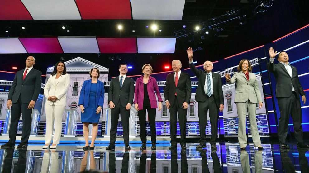 PHOTO: Democratic presidential hopefuls arrive onstage for the fifth Democratic primary debate of the 2020 presidential campaign season in Atlanta, Nov. 20, 2019.