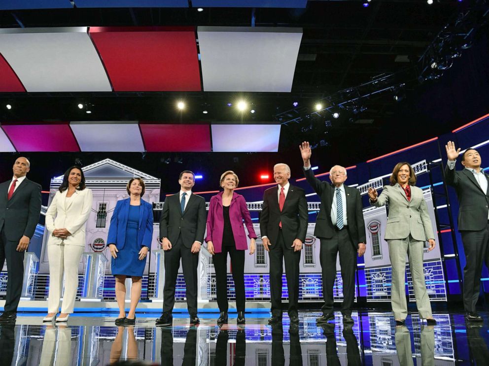 PHOTO: Democratic presidential hopefuls arrive onstage for the fifth Democratic primary debate of the 2020 presidential campaign season in Atlanta, Nov. 20, 2019.