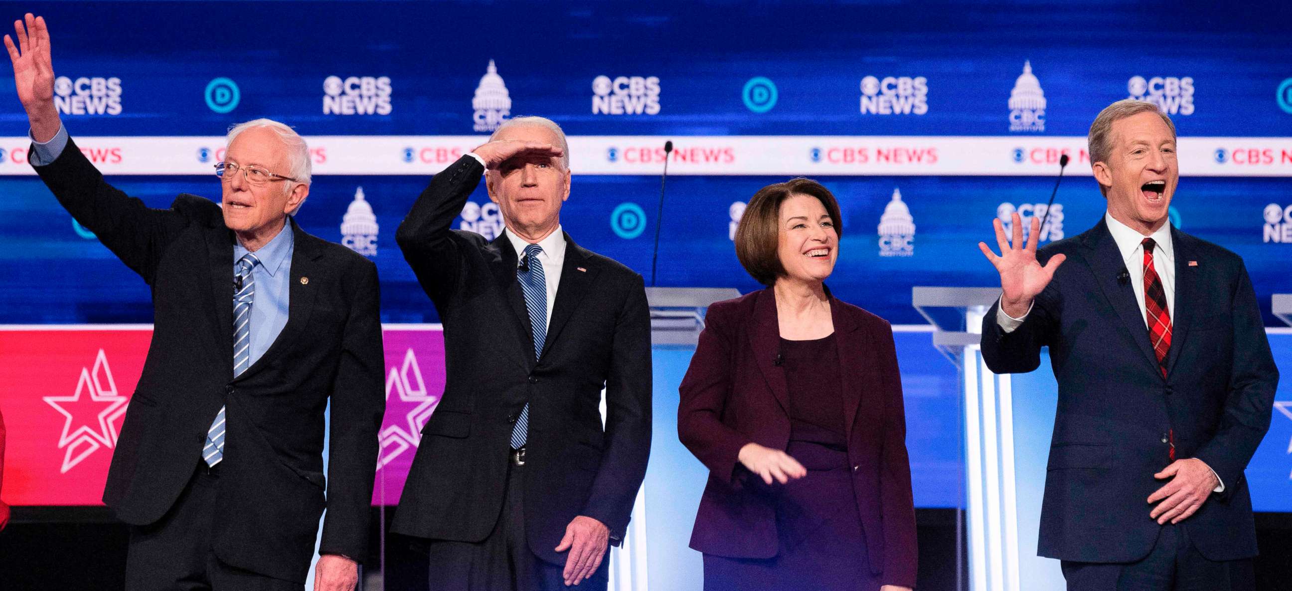 PHOTO: Democratic presidential hopefuls arrive on stage for the tenth Democratic primary debate at the Gaillard Center in Charleston, South Carolina, Feb. 25, 2020.
