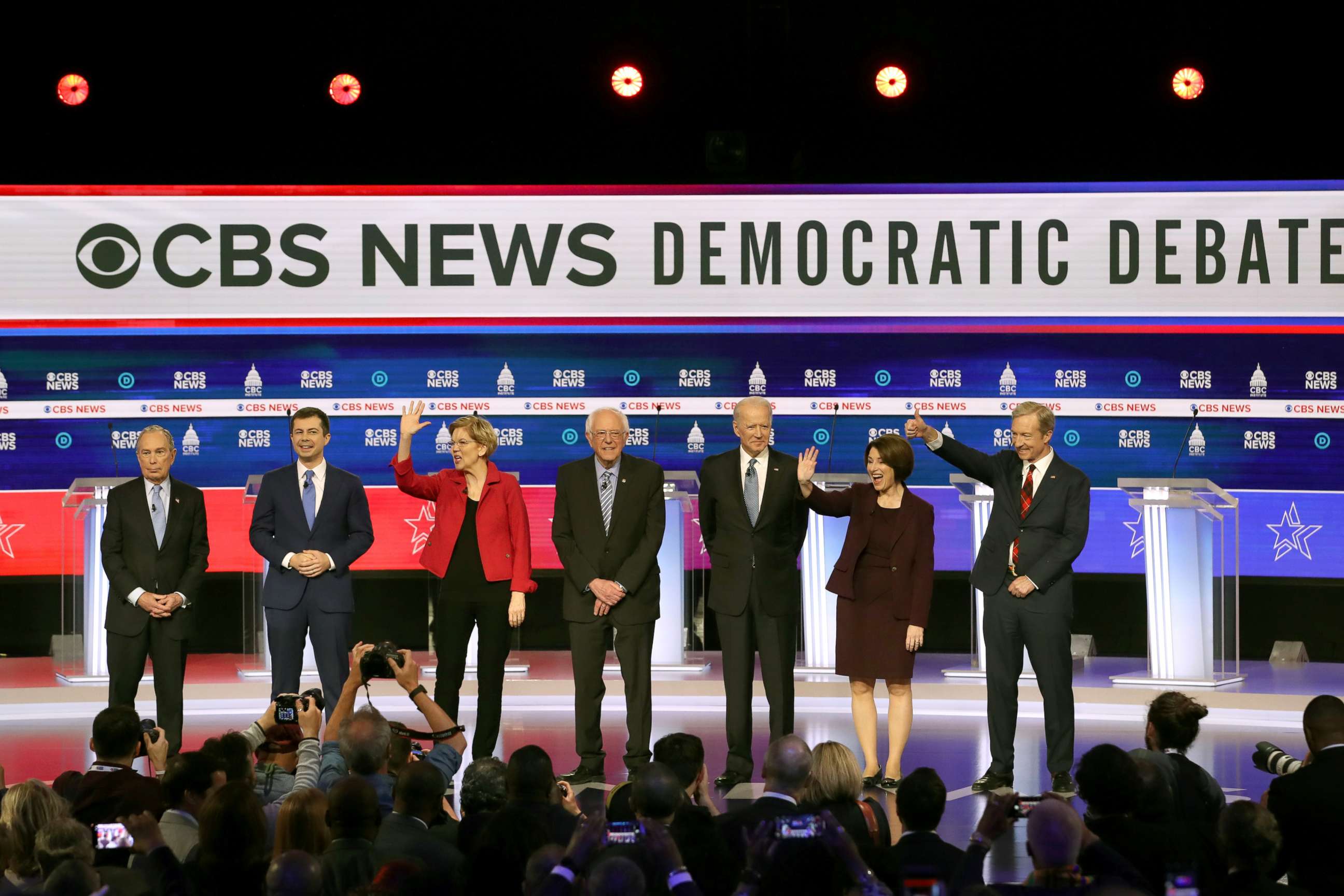 PHOTO: Democratic presidential hopefuls arrive on stage for the tenth Democratic primary debate at the Gaillard Center in Charleston, South Carolina, Feb. 25, 2020.